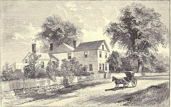 house with horse and carrage going by
