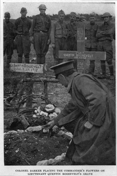 Colonel Barker placing the commander’s flowers on Lieutenant Quentin Roosevelt’s grave