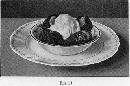 [Illustration: FIG. 21, Stewed prunes stuffed with peanut butter.]