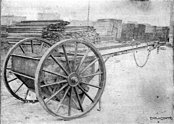 Fig: 113.—Briggs Cart Distributing Concrete for Pavement
Foundation.